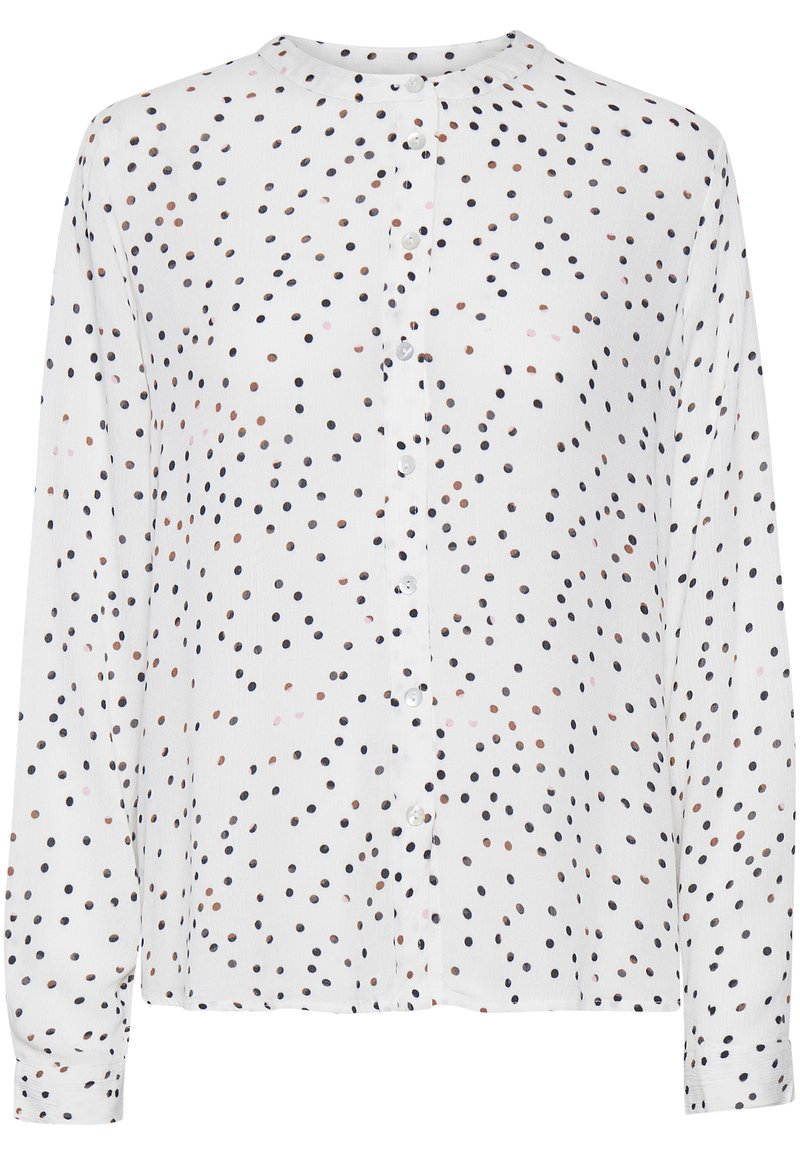 Blouse blanche à manches longues avec encolure ronde, fermeture à boutons sur le devant, et pois multicolores éparpillés en marine, rose et marron.