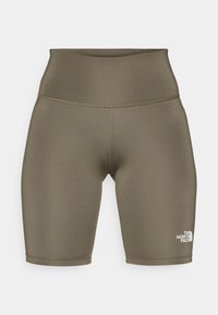 Ποδηλατικά σορτς με ψηλή μέση σε ελιά πράσινο, κατασκευασμένα από ελαστικό υλικό. Διαθέτουν λογότυπο στο κάτω αριστερό πόδι και ομαλές ραφές σε όλο το μήκος.