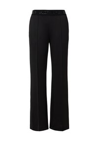 Pantalons larges noirs avec une taille plate présentant des lettres en relief. Fabriqués dans un tissu lisse, ils ont une coupe décontractée et n'ont pas de poches.