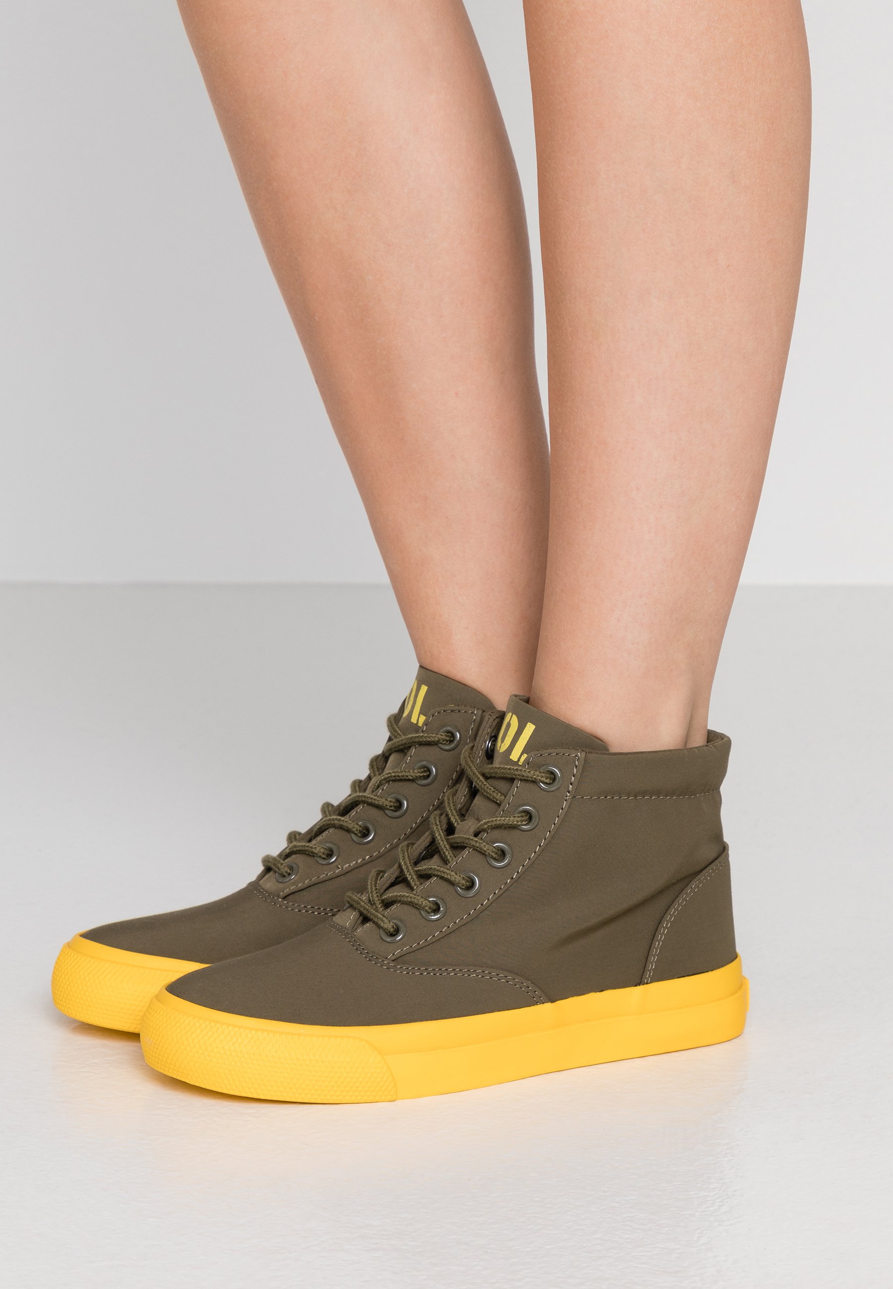 yellow high top trainers