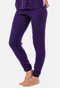 Lila Leggings aus weichem Stoff mit enganliegendem Design und gerafften Bündchen an den Knöcheln für mehr Komfort.