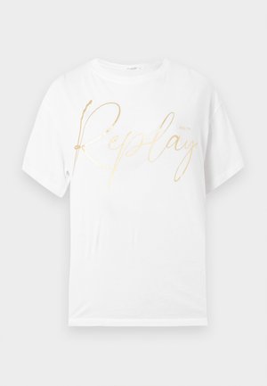 Bijela pamučna majica s velikim, kurzivnim zlatnim logotipom "Replay" na prednjoj strani. Opusti kroj s kratkim rukavima i okruglim izrezom.
