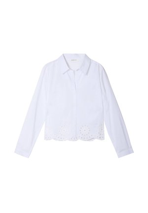 Chemise blanche à boutons sur le devant, à manches longues, avec un ourlet festonné brodé et des motifs circulaires découpés le long du bas.