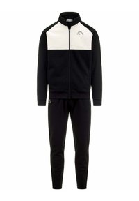 Chándal deportivo negro que incluye una chaqueta con cremallera y paneles blancos en los hombros, junto con pantalones negros a juego, fabricado en un tejido suave y liso.