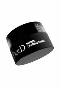 Barattolo rotondo nero di FaceD Retinol Liposome Cream; superficie liscia, coperchio trasparente, testo bianco sulla parte frontale, design minimalista.
