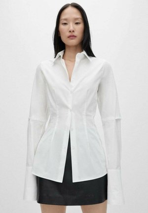 Mango SEPRAGA - Button-down blouse - white