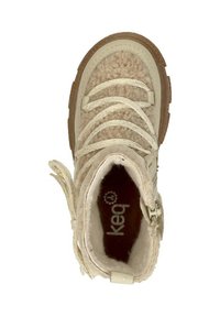 Tan fuzzy textiel laars met witte veters, rubberen zool en ritssluiting. Binnenvoering van zacht materiaal, met logo op de binnenzool.