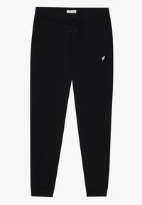 Black sweatpants with a drawstring waist, side pockets, and a small white logo on the left thigh. Soft fabric with ribbed cuffs.