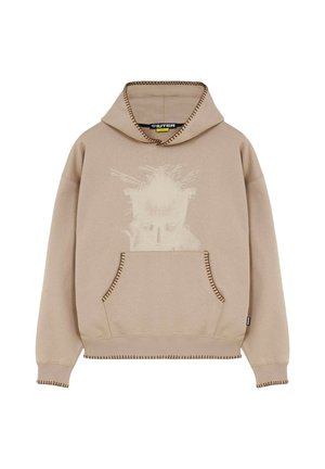 Felpa beige con cappuccio, tasca a marsupio frontale, cuciture scure a contrasto e grafica astratta di volto chiaro sul petto.