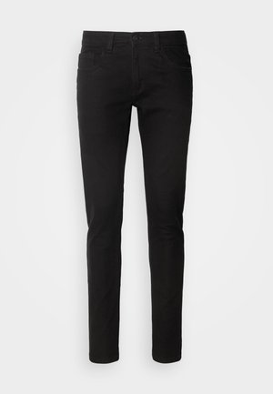 Vaqueros de mezclilla negra con un ajuste slim, diseño de cinco bolsillos, cremallera en la bragueta y una textura limpia y suave. Cintura estándar con pasadores para cinturón.