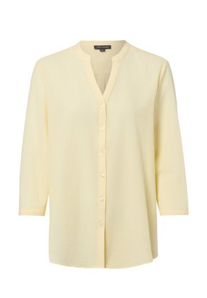 Blouse jaune clair boutonnée, manches longues et col en V sans col, taille 36, par Franco Callegari.