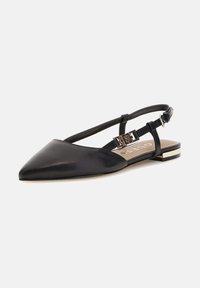 Black leather slingback flat with a pointed toe, featuring a decorative metallic buckle and a low gold-accented heel. Smooth texture.