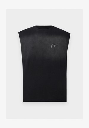 Zwarte mouwloze T-shirt met gewatteerde schouders en kleine witte sierletters op de linkerborst met de tekst "Your Story."