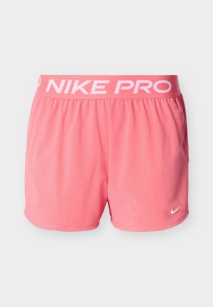 Ροζ αθλητικό σορτς Nike Pro με ελαστική μέση που φέρει λευκά γράμματα "NIKE PRO", λείο ύφασμα και πλαϊνές τσέπες.