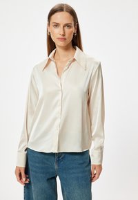 Blusa - off white