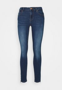Smarte bukser i mørkeblå denim med en glat tekstur, høj talje, fem lommer og sølvfarvede lynlåsdetaljer ved anklene.