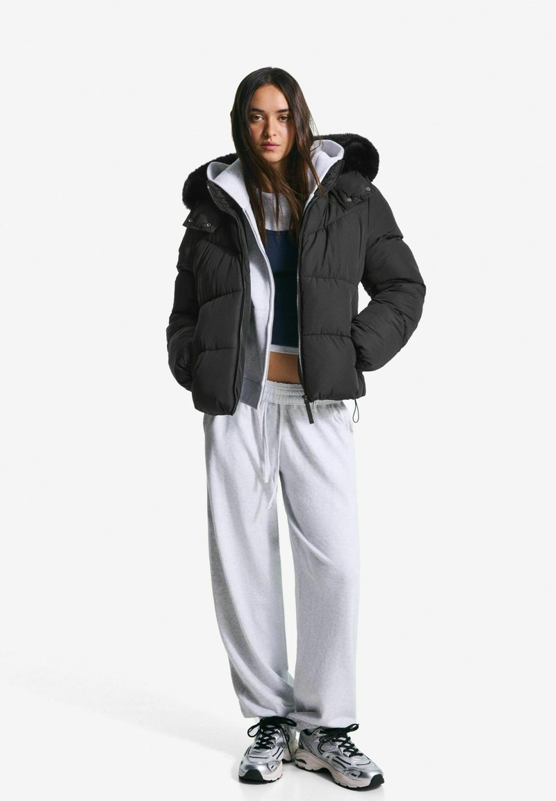 Bershka Winterjacke black/schwarz Zalando