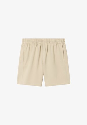 Pantalones cortos casuales beige con cintura elástica y bolsillos laterales, hechos de tela suave, ideales para un uso relajado.