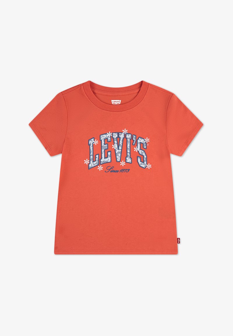 Červené bavlněné tričko s modro-bílým grafickým nápisem "LEVI'S" doplněným květinovými motivy, krátkými rukávy a kulatým výstřihem.