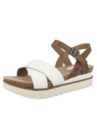 Witte lederen wedge sandalen met bruine verstelbare enkelband, kurken voetbed en witte rubberen zool. Heeft een kruisbandontwerp.