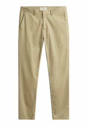 Beige Herrenhose mit geradem Bein, Gürtelschlaufen, Fronttaschen und Reißverschluss, flach auf einem weißen Hintergrund ausgelegt.