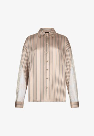 Chemise beige à manches longues boutonnée avec des rayures verticales noires et blanches et des panneaux en dentelle florale transparente sur les manches.