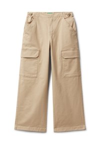 Beige široké cargo kalhoty se velkými předními klopovými kapsami a elastickým pasem s nastavitelnými bočními popruhy.