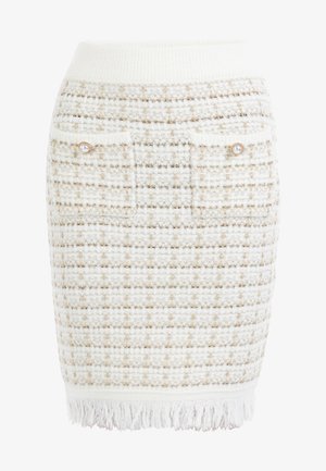 Bijela pencil suknja od tvida s zlatnim koncem, rebrastim pojasom, dva detalja džepova i resastim rubom. Teksturirani uzorak kroz cijelu suknju.