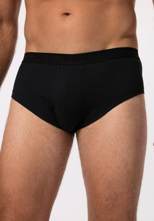Schwarze Baumwollunterhose mit einem schlichten Design, ausgestattet mit einem weichen schwarzen Bund, der mit "JP1880" geprägt ist. Der Stoff hat eine glatte Textur.