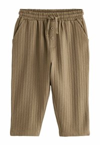 Beige relaxed-fit pants with a textured stripe pattern, elastic waistband, and drawstring. Features two side pockets and button detail.