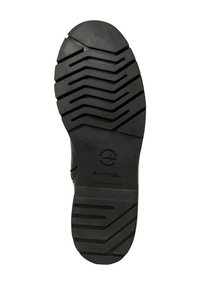 Black rubber sole with a zigzag tread pattern; features a circular logo and textured surface for grip and durability.