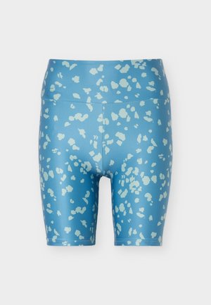 Μπλε ψηλόμεσα ποδηλατικά σορτς με ακανόνιστο μονόχρωμο φωτεινό σχέδιο, άκοπη ραφή και ραφή μπροστά στο κέντρο.