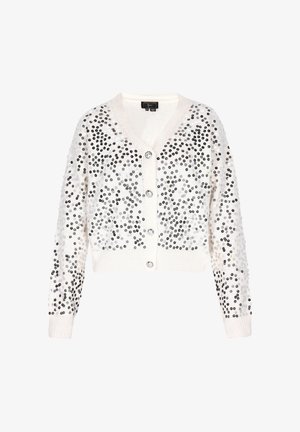 Cardigan bianco con paillettes nere e argento, scollatura a V, maniche lunghe e polsini e orlo a costine. Presenta cinque bottoni trasparenti.