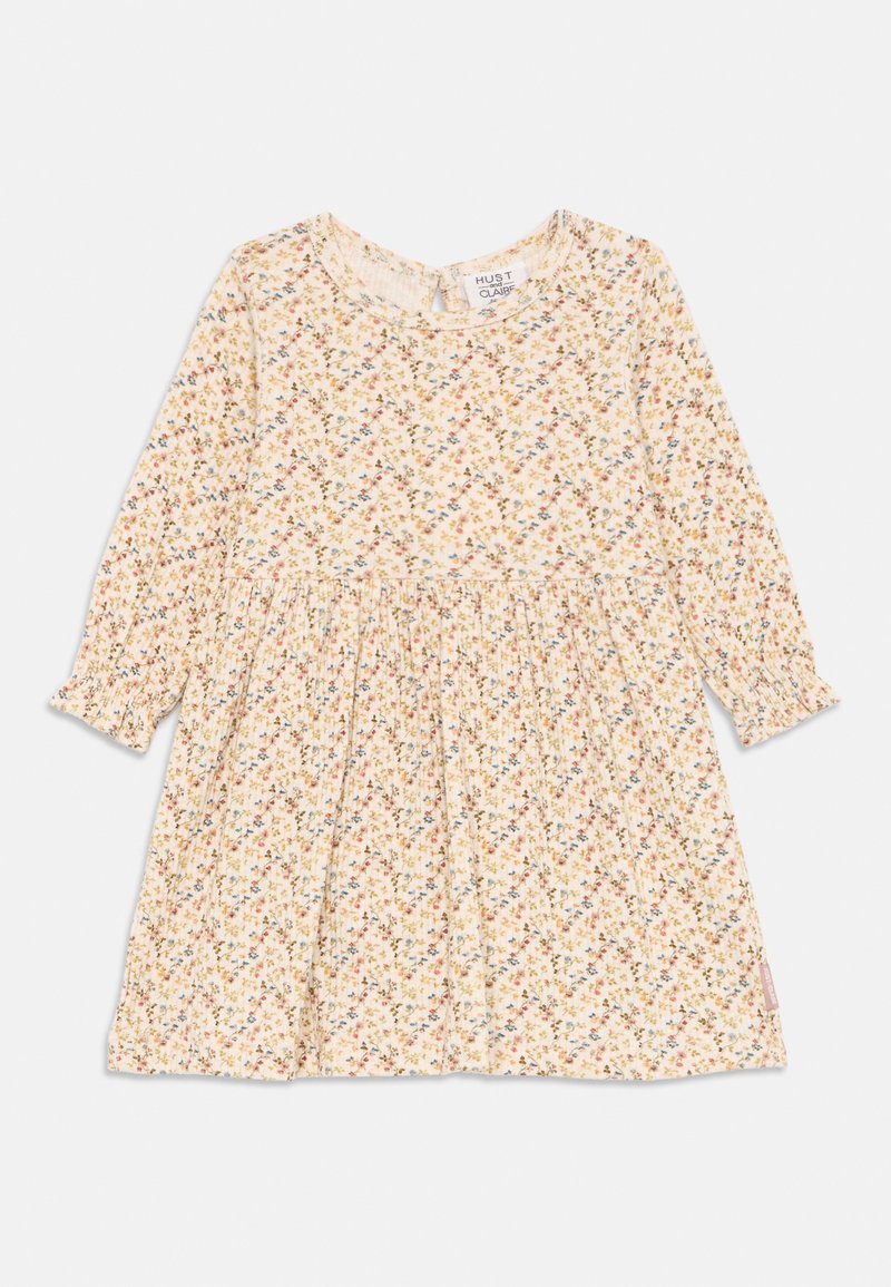 Langärmliges Kleid mit floralem Muster aus weichem, cremefarbenem Stoff. Verfügt über eine geraffte Taille und elastische Bündchen mit kleinen, bunten Blumen überall.