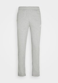 Grå bomullssweatpants med tapered design. Har en elastisk midja och en liten vit logo på övre vänstra låret. Slät textur.