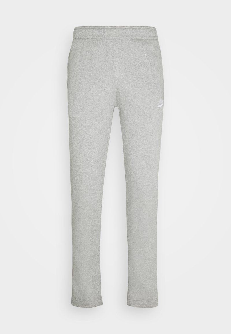 Pantalons de survêtement en coton gris avec une coupe fuselée. Dotés d'une taille élastique et d'un petit logo blanc sur la cuisse supérieure gauche. Texture lisse.
