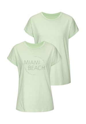Lichtgroene katoen T-shirt met korte mouwen en een ronde halslijn. Bevat de tekst "MIAMI BEACH" en een cirkelvormig grafisch ontwerp.