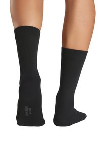 Black knee-high socks made of a smooth, stretchy material with a seamless design and ribbed cuff. No visible patterns or accents.