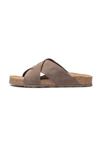 Sandales à bride en daim marron avec des sangles croisées et une semelle en liège. Caractérisées par une semelle en caoutchouc texturé pour une meilleure adhérence et durabilité.