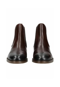 Botas chelsea de cuero marrón con un acabado suave, punteras redondeadas, paneles laterales elásticos y una suela de goma de perfil bajo.
