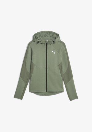 Veste légère à capuche, couleur vert clair, fermeture éclair intégrale, avec panneaux en mesh sur les manches et les côtés, capuche ajustable, et logo Puma blanc sur la poitrine.