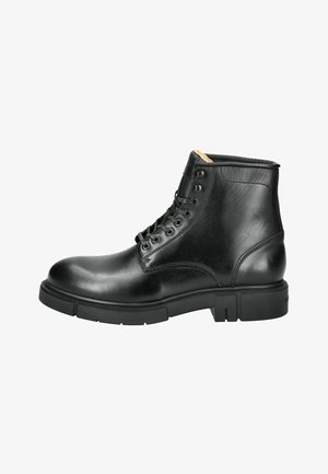 Stivaletto in pelle nera con punta rotonda, stringato davanti e suola texturizzata. Presenta una finitura liscia e dettagli di cucitura rinforzata.