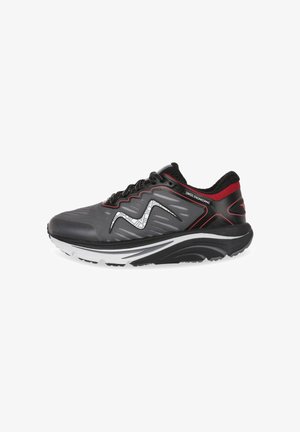 Black and grey athletic shoe with textured upper, reflective accents, prominent logo, padded collar, and a contrasting white midsole.
