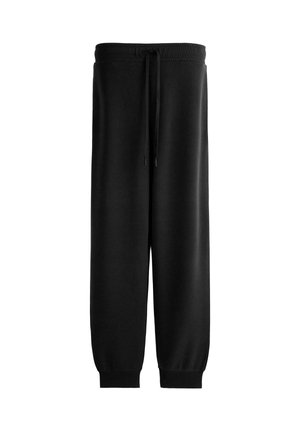 Čierne teplákové nohavice s manžetami, elastickým pásom a šnúrkou, rovný strih, vyrobené z mäkkej látky.