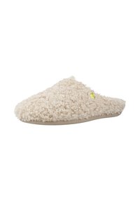 Chausson beige doublé de fourrure avec un extérieur texturé et duveteux et une semelle marron, présentant un petit accent jaune fluo près du côté.