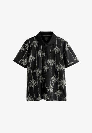 Polo à manches courtes en tissu noir avec un motif de palmiers blancs. Il dispose d'un col et d'une patte de boutonnage à l'avant pour la fermeture. Texture lisse.