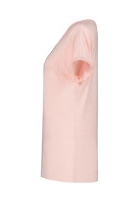 Ljusrosa kortärmad t-shirt i ett mjukt, slätt material. Har en klassisk passform och rundad halsringning utan synliga mönster eller detaljer.