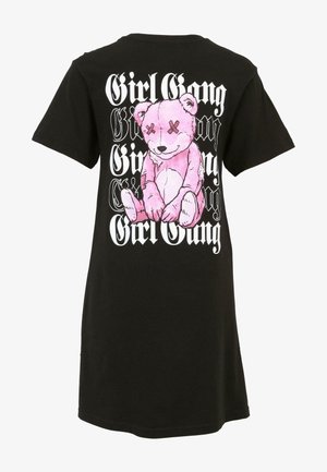 Schwarzes Baumwoll-T-Shirt mit einem großen pinken Teddybär-Graphic auf dem Rücken, umgeben von fettem Text, der "Girl Gang" in Weiß liest.