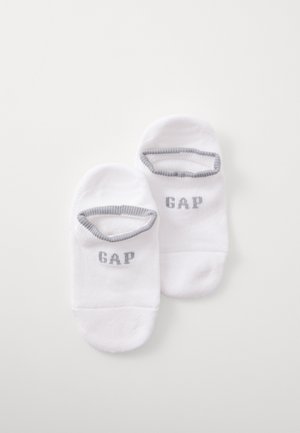 White ankle socks with gray ribbed cuffs. "GAP" logo in gray on the outer side. Soft, stretchy fabric with a smooth texture.