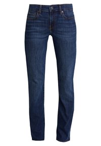 Jeans de mezclilla oscura con un corte ajustado, que incluye cinco bolsillos, pasadores para cinturón y una bragueta con cierre de botón. Textura suave y tono azul.